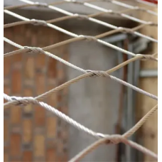Сетка нержавеющая тросовая с узловым креплением и ромбической ячейкой Н5 7х7 AISI 304 30х52х1 мм